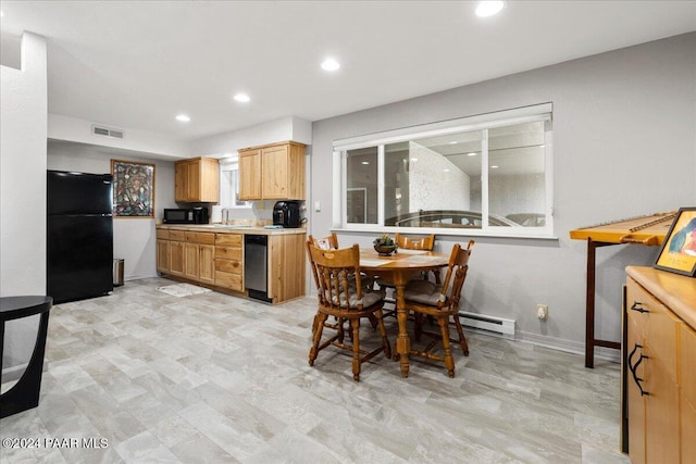 dining room with a baseboard radiator