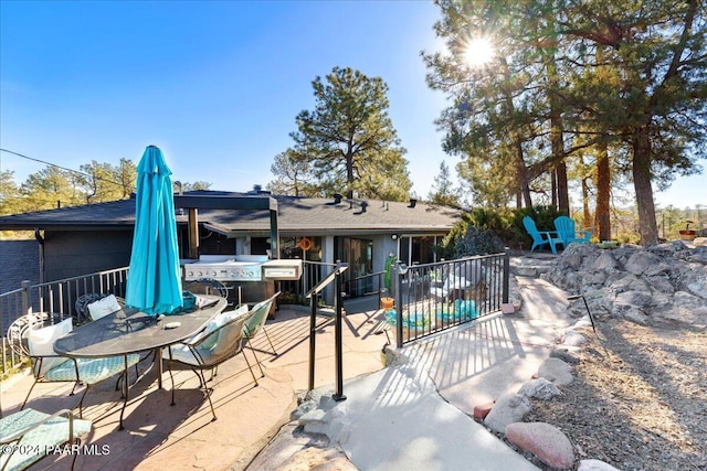 1568 W Thumb Butte Rd, Prescott, AZ 86305 - rear view of property with a patio and outdoor dining space