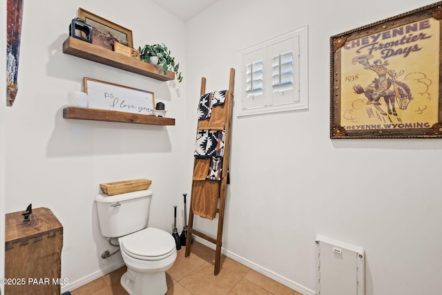 8950 N Calico Cat Trl, Prescott Valley, AZ 86315 - half bathroom with toilet, baseboards, and tile patterned flooring