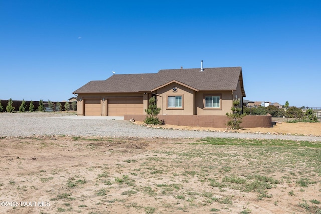 8950 N Calico Cat Trl, Prescott Valley, AZ 86315 - single story home featuring driveway, a garage, stucco siding, and a shingled roof