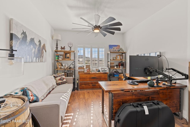 8950 N Calico Cat Trl, Prescott Valley, AZ 86315 - office area with a ceiling fan and wood finished floors