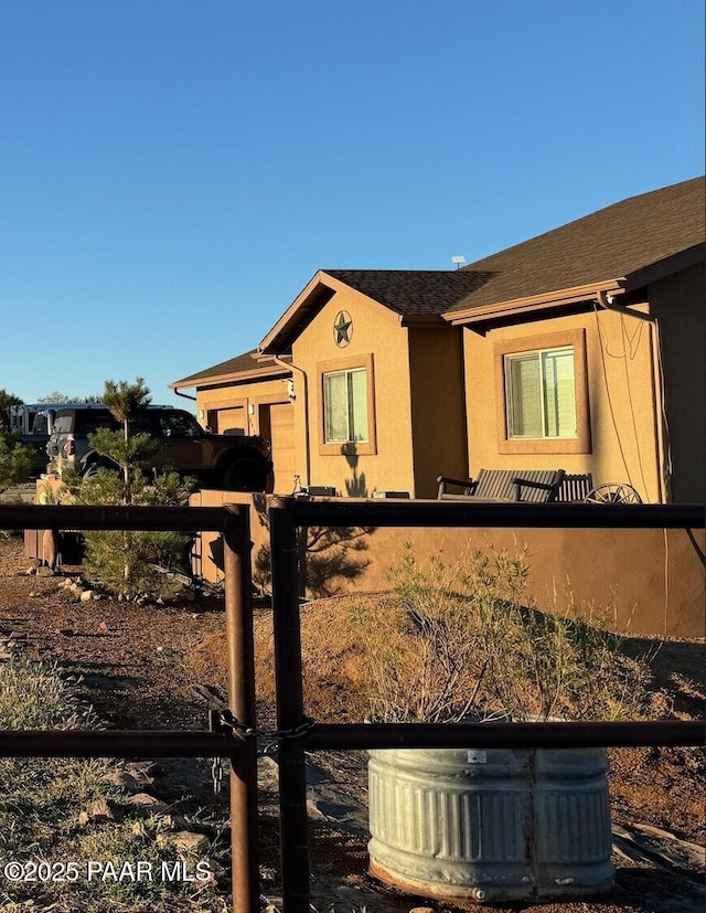 8950 N Calico Cat Trl, Prescott Valley, AZ 86315 - ranch-style house with a garage and stucco siding