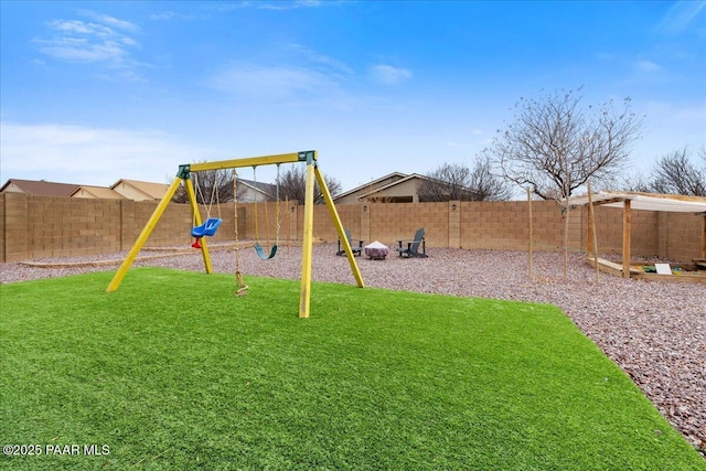 view of playground with a yard