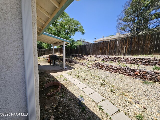 5050 N Saddleback Dr, Prescott Valley, AZ 86314 - fenced backyard featuring a patio