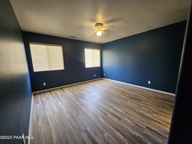 5050 N Saddleback Dr, Prescott Valley, AZ 86314 - unfurnished room featuring a ceiling fan and wood finished floors