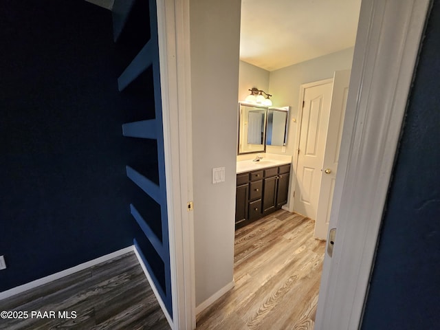 5050 N Saddleback Dr, Prescott Valley, AZ 86314 - bathroom featuring wood finished floors and vanity