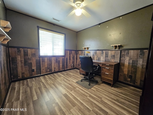5050 N Saddleback Dr, Prescott Valley, AZ 86314 - office area featuring wainscoting, wood finished floors, wood walls, and a ceiling fan