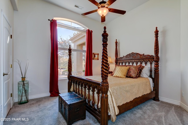 bedroom featuring ceiling fan and carpet