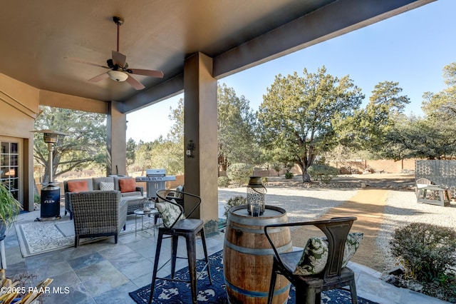 view of patio / terrace featuring an outdoor hangout area, ceiling fan, and area for grilling