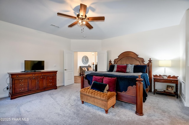 carpeted bedroom featuring ceiling fan