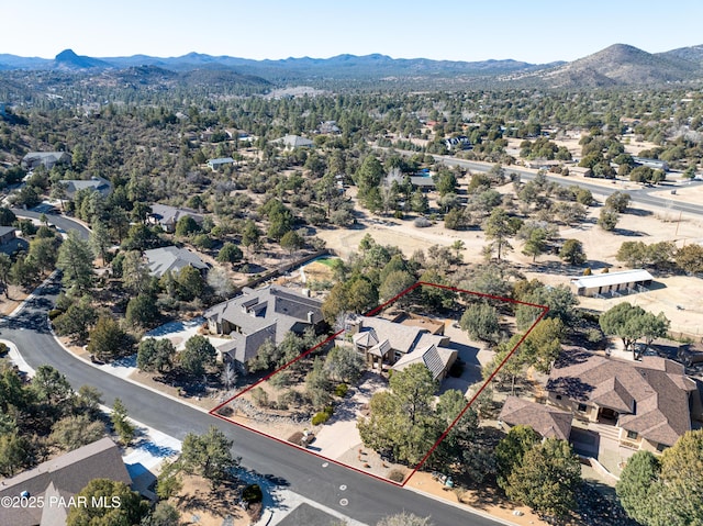 drone / aerial view featuring a mountain view