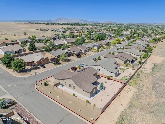 2690 Capella Dr, Chino Valley, AZ 86323 - aerial view of residential area featuring a mountain backdrop and property parcel outlined