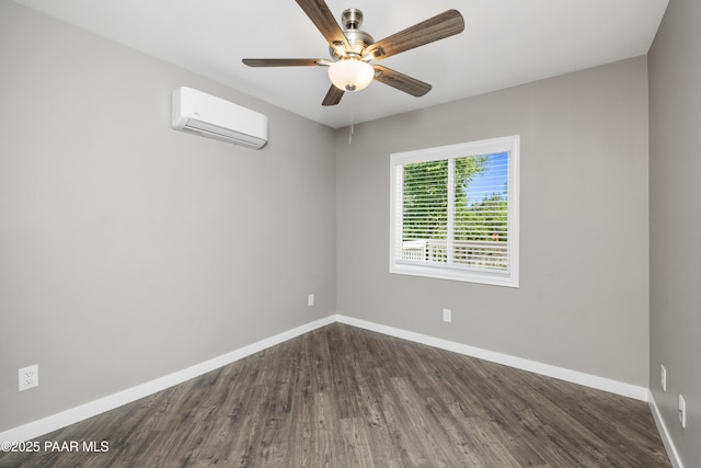 empty room featuring ceiling fan, a wall mounted air conditioner, and dark hardwood / wood-style floors