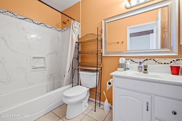 full bathroom with tile patterned floors, vanity, shower / tub combo, and toilet