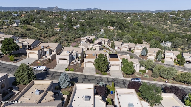 drone / aerial view featuring a mountain view