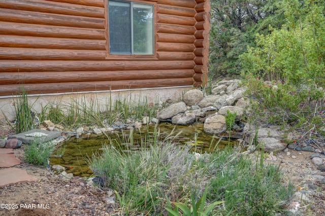 1070 Quiet Pines Ln, Prescott, AZ 86303 - exterior view of log siding