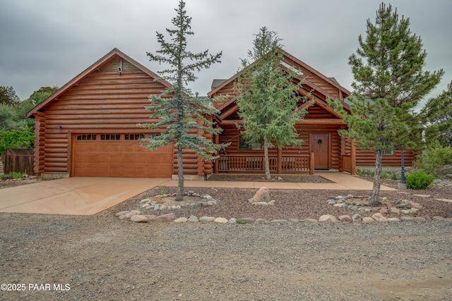 1070 Quiet Pines Ln, Prescott, AZ 86303 - log cabin with log siding and concrete driveway