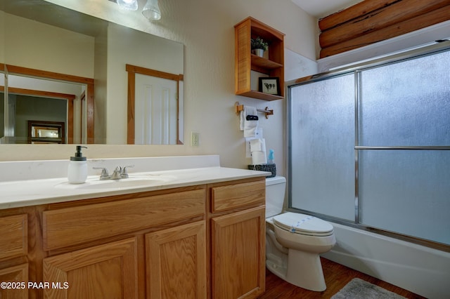 1070 Quiet Pines Ln, Prescott, AZ 86303 - full bathroom with vanity, wood finished floors, and enclosed tub / shower combo