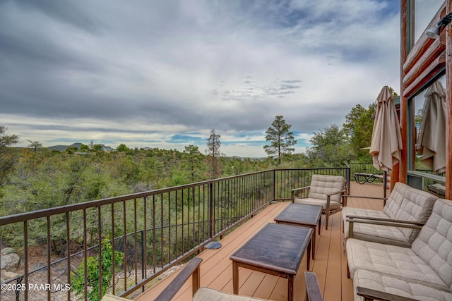 1070 Quiet Pines Ln, Prescott, AZ 86303 - wooden terrace featuring an outdoor hangout area and a forest view