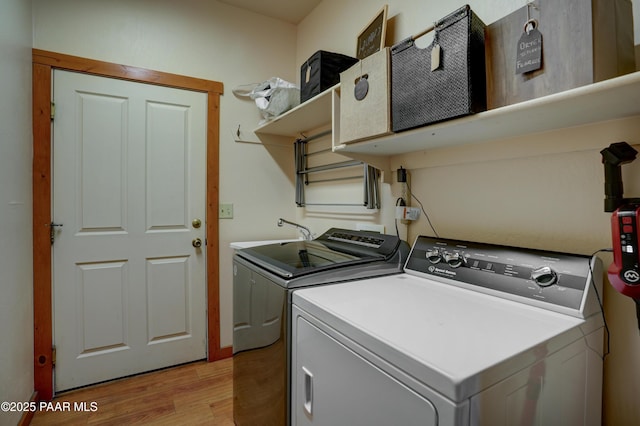 1070 Quiet Pines Ln, Prescott, AZ 86303 - washroom with light wood finished floors and independent washer and dryer