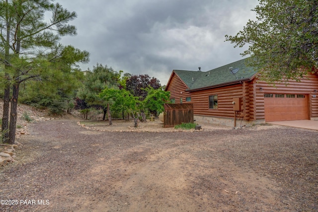 1070 Quiet Pines Ln, Prescott, AZ 86303 - view of yard with driveway and an attached garage