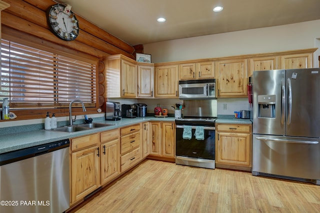 1070 Quiet Pines Ln, Prescott, AZ 86303 - kitchen featuring appliances with stainless steel finishes, light countertops, light wood-type flooring, light brown cabinetry, and recessed lighting