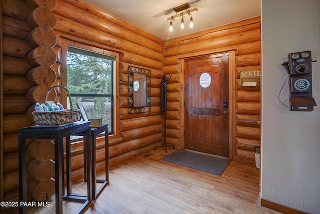 1070 Quiet Pines Ln, Prescott, AZ 86303 - entrance foyer featuring light wood-style flooring and log walls