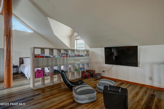 1070 Quiet Pines Ln, Prescott, AZ 86303 - living area with lofted ceiling, wood finished floors, and a wall mounted AC
