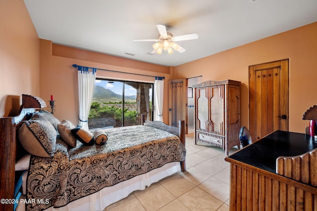 12390 E Triple T Ln, Prescott Valley, AZ 86315 - bedroom featuring ceiling fan, access to exterior, and light tile patterned floors