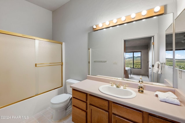 12390 E Triple T Ln, Prescott Valley, AZ 86315 - full bathroom with vanity, enclosed tub / shower combo, and toilet