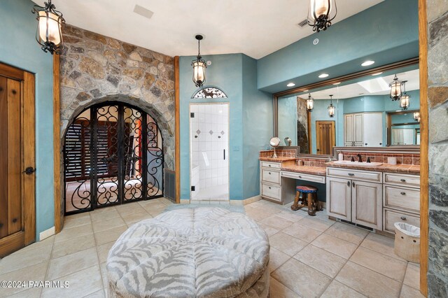 12390 E Triple T Ln, Prescott Valley, AZ 86315 - bathroom featuring tile patterned floors, a shower, french doors, and vanity