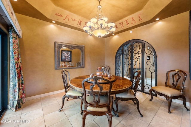 12390 E Triple T Ln, Prescott Valley, AZ 86315 - tiled dining room featuring a tray ceiling and a notable chandelier