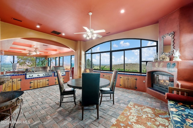 12390 E Triple T Ln, Prescott Valley, AZ 86315 - dining space with ceiling fan and sink