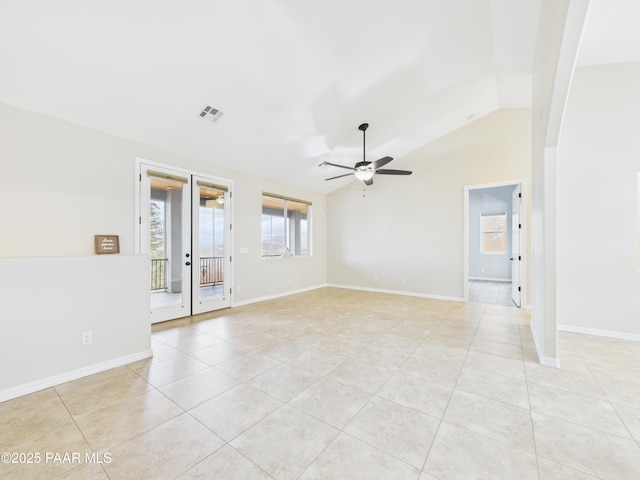15606 E Sterling Spur Rd, Dewey-Humboldt, AZ 86327 - unfurnished room featuring a wealth of natural light, a ceiling fan, french doors, and light tile patterned floors