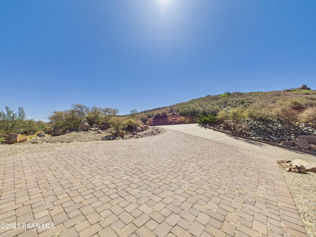 15606 E Sterling Spur Rd, Dewey-Humboldt, AZ 86327 - exterior space featuring decorative driveway
