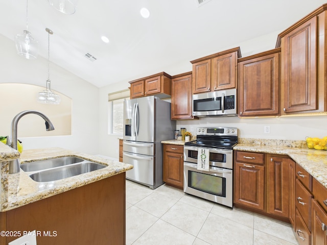 15606 E Sterling Spur Rd, Dewey-Humboldt, AZ 86327 - kitchen featuring a sink, light tile patterned floors, pendant lighting, stainless steel appliances, and visible vents