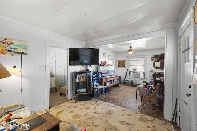 living room with hardwood / wood-style flooring and cooling unit