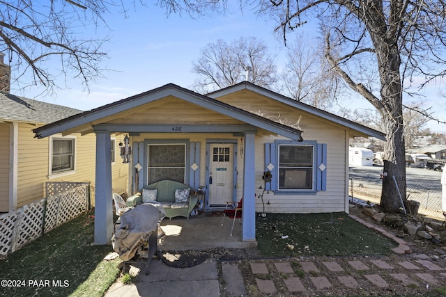 bungalow-style home with a porch