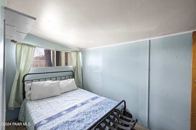 bedroom with vaulted ceiling