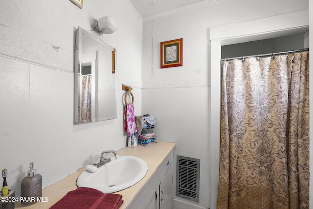 bathroom with ornamental molding, vanity, and a shower with shower curtain