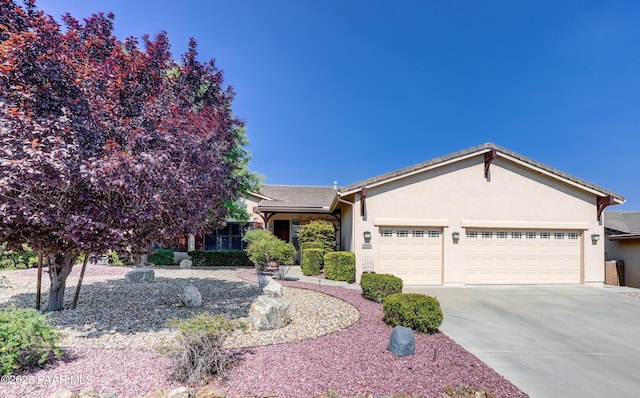 3096 Adobe Springs Dr, Prescott, AZ 86301 - ranch-style house featuring an attached garage, concrete driveway, and stucco siding