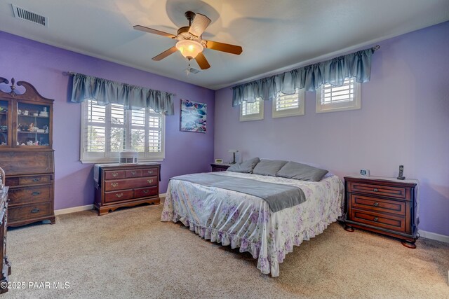 3096 Adobe Springs Dr, Prescott, AZ 86301 - carpeted bedroom with multiple windows and ceiling fan