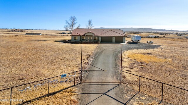 exterior space with a mountain view and a rural view