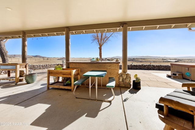 view of patio / terrace with an outdoor bar