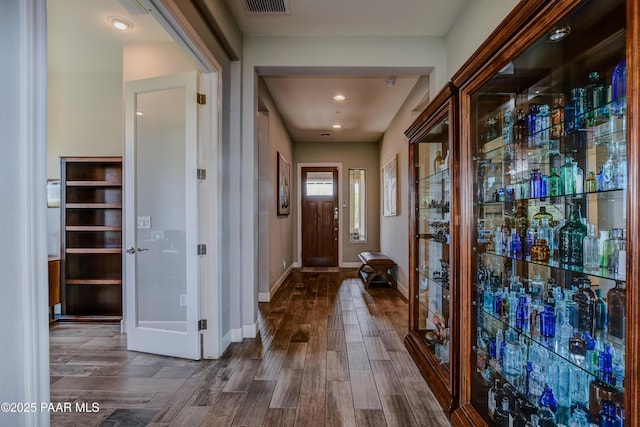 892 Canyon Breeze Ct, Prescott, AZ 86303 - hallway with baseboards, recessed lighting, dark wood finished floors, and visible vents
