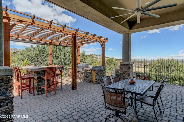 892 Canyon Breeze Ct, Prescott, AZ 86303 - view of patio featuring fence, outdoor dry bar, a pergola, exterior kitchen, and area for grilling