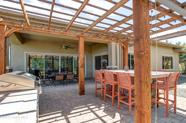 892 Canyon Breeze Ct, Prescott, AZ 86303 - view of patio / terrace with outdoor dining area, ceiling fan, exterior kitchen, and a pergola