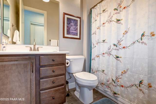 892 Canyon Breeze Ct, Prescott, AZ 86303 - bathroom featuring curtained shower, wood finished floors, vanity, baseboards, and toilet