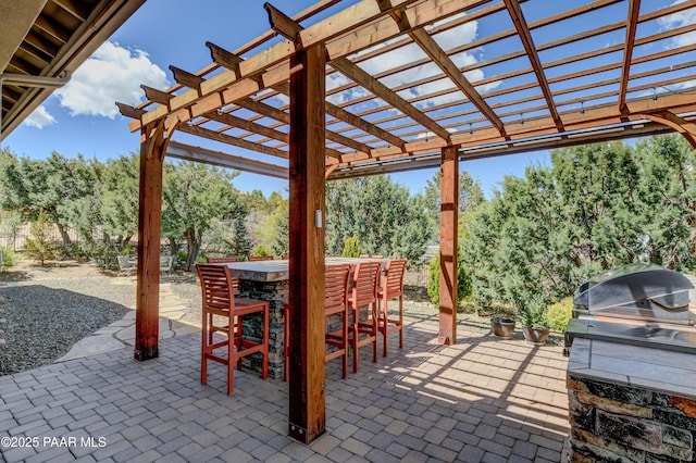 892 Canyon Breeze Ct, Prescott, AZ 86303 - view of patio featuring an outdoor kitchen, outdoor dry bar, and a pergola