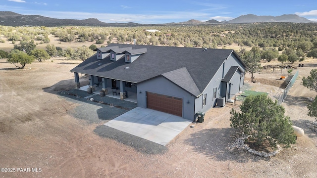 drone / aerial view featuring a mountain view